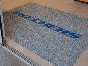 Logo v koberci - Čistící zóny